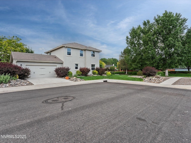 1105 Fiore Ct, Minden, NV 89423 - traditional home with stucco siding, an attached garage, and concrete driveway