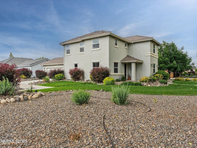 1105 Fiore Ct, Minden, NV 89423 - view of property exterior featuring stucco siding and a yard