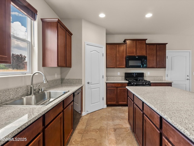 1105 Fiore Ct, Minden, NV 89423 - kitchen featuring black appliances, a sink, and recessed lighting