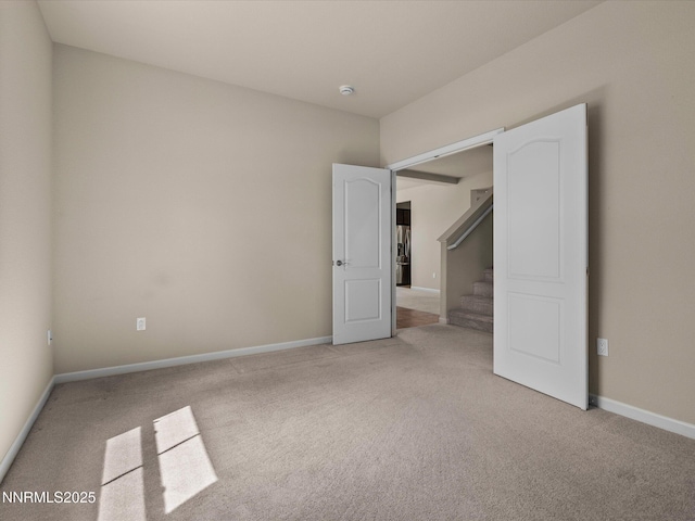 1105 Fiore Ct, Minden, NV 89423 - unfurnished bedroom featuring light colored carpet and baseboards