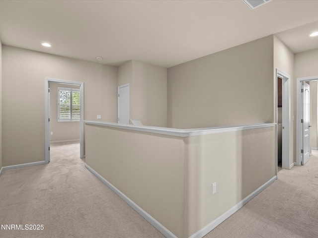 1105 Fiore Ct, Minden, NV 89423 - hall featuring light carpet, baseboards, and recessed lighting