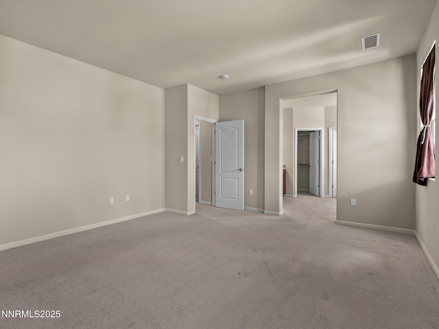 1105 Fiore Ct, Minden, NV 89423 - unfurnished bedroom with light carpet, baseboards, and a spacious closet