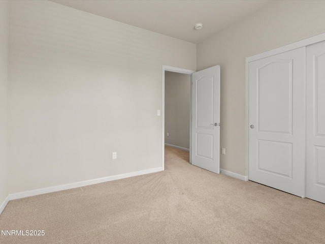 1105 Fiore Ct, Minden, NV 89423 - unfurnished bedroom with carpet flooring, baseboards, and a closet