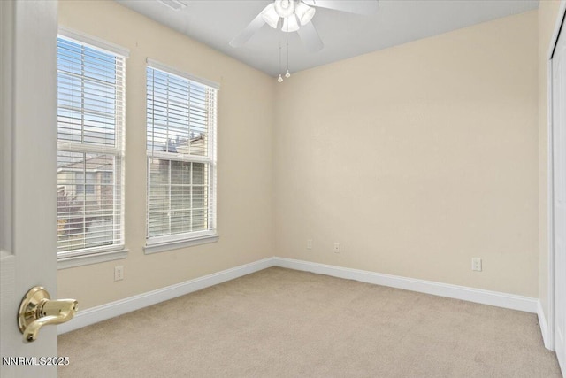 1239 Flintwood Dr, Carson City, NV 89703 - spare room with light colored carpet, a ceiling fan, and baseboards