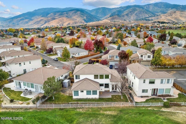 1239 Flintwood Dr, Carson City, NV 89703 - aerial perspective of suburban area featuring a mountainous background