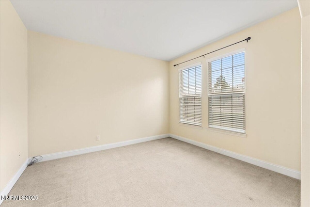 1239 Flintwood Dr, Carson City, NV 89703 - unfurnished room with light carpet and baseboards