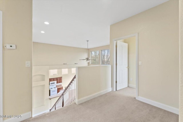 1239 Flintwood Dr, Carson City, NV 89703 - corridor with an upstairs landing, carpet flooring, baseboards, and recessed lighting
