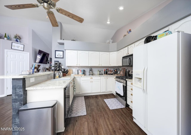 791 Noel Ln, Fallon, NV 89406 - kitchen with black appliances, a sink, lofted ceiling, dark wood finished floors, and white cabinetry