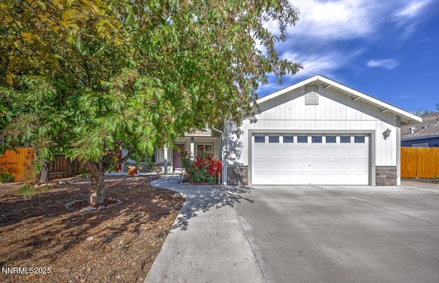 791 Noel Ln, Fallon, NV 89406 - ranch-style home featuring stone siding, concrete driveway, and a garage