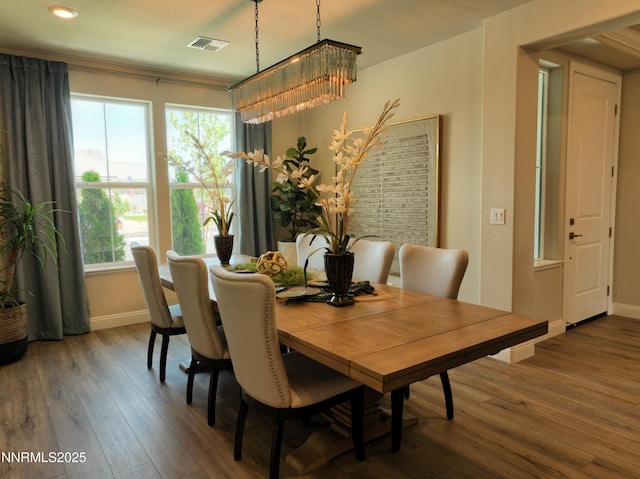 2350 Seaberry Dr, Sparks, NV 89441 - dining room with baseboards, wood finished floors, a chandelier, and recessed lighting