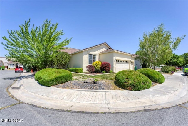 1328 Windridge Dr, Carson City, NV 89706 - view of front of house with a garage and stucco siding