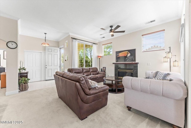 1328 Windridge Dr, Carson City, NV 89706 - living room featuring ornamental molding, ceiling fan, a high end fireplace, and light carpet