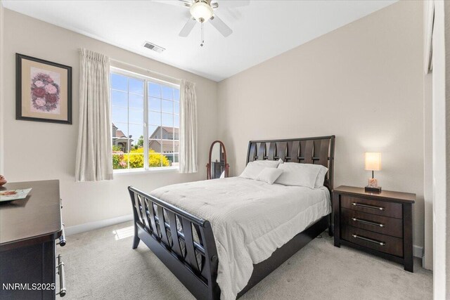 1328 Windridge Dr, Carson City, NV 89706 - bedroom with light carpet, baseboards, and a ceiling fan