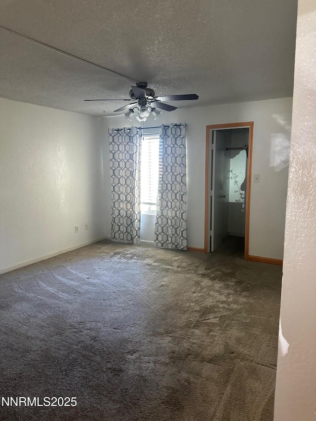 3926 Clear Acre Ln Unit 107, Reno, NV 89512 - carpeted empty room featuring a ceiling fan, baseboards, and a textured ceiling