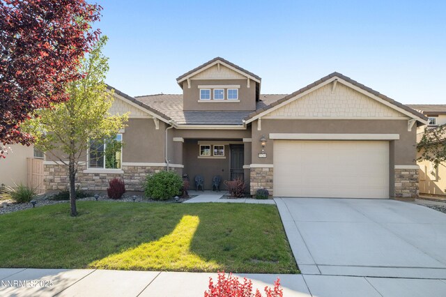 10260 Rollins Dr, Reno, NV 89521 - craftsman-style house with stone siding, an attached garage, stucco siding, a front yard, and driveway