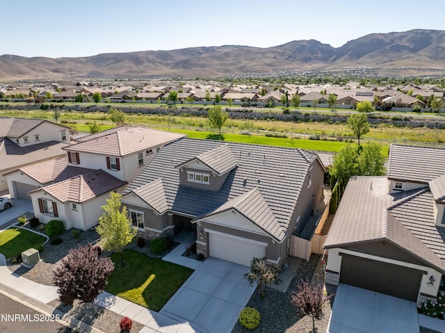 10260 Rollins Dr, Reno, NV 89521 - aerial perspective of suburban area with a mountainous background