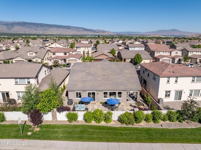 10260 Rollins Dr, Reno, NV 89521 - aerial view of residential area featuring a mountainous background