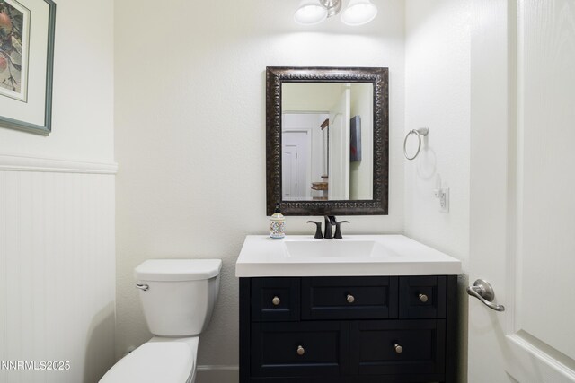 10260 Rollins Dr, Reno, NV 89521 - half bath featuring toilet and vanity