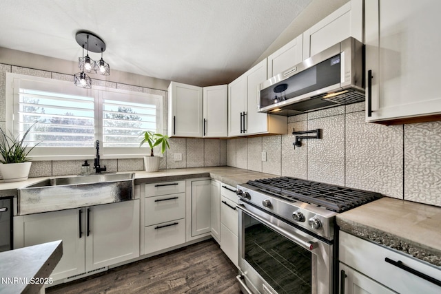 772 Mammoth Way, Gardnerville, NV 89460 - kitchen with appliances with stainless steel finishes, healthy amount of natural light, a sink, white cabinetry, and lofted ceiling