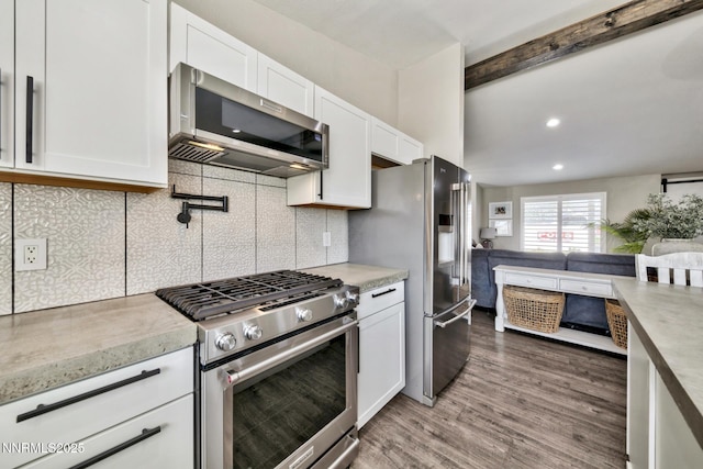 772 Mammoth Way, Gardnerville, NV 89460 - kitchen with appliances with stainless steel finishes, light countertops, white cabinetry, beam ceiling, and recessed lighting