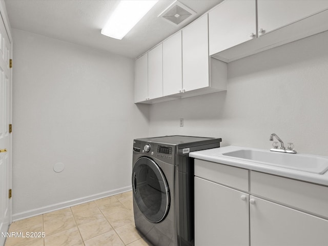 4943 Foxcreek Trl, Reno, NV 89519 - laundry room with cabinet space, washer / dryer, and baseboards