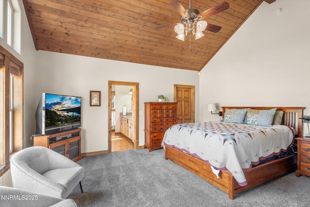 2607 Bowers Rd, Gardnerville, NV 89410 - bedroom featuring wooden ceiling, carpet floors, high vaulted ceiling, baseboards, and ensuite bathroom