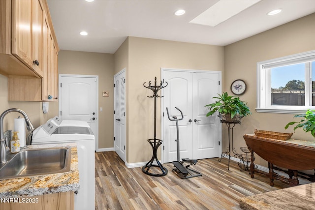 2607 Bowers Rd, Gardnerville, NV 89410 - laundry room featuring separate washer and dryer, cabinet space, wood finished floors, baseboards, and recessed lighting