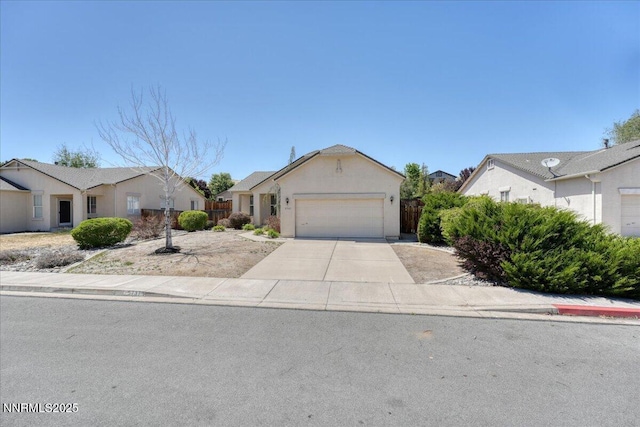 5737 Sonora Pass Dr, Sparks, NV 89436 - single story home with an attached garage, concrete driveway, stucco siding, and a residential view