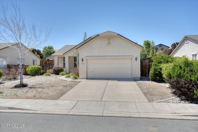 5737 Sonora Pass Dr, Sparks, NV 89436 - single story home featuring an attached garage, driveway, and stucco siding