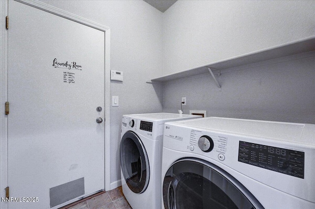 5737 Sonora Pass Dr, Sparks, NV 89436 - laundry area with independent washer and dryer and tile patterned floors