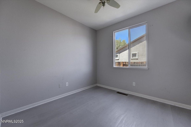 5737 Sonora Pass Dr, Sparks, NV 89436 - unfurnished room with ceiling fan, baseboards, and wood finished floors