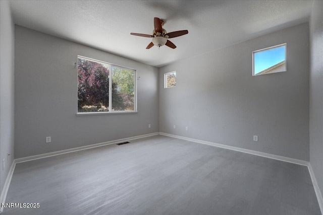 5737 Sonora Pass Dr, Sparks, NV 89436 - unfurnished room with plenty of natural light, wood finished floors, a ceiling fan, and baseboards
