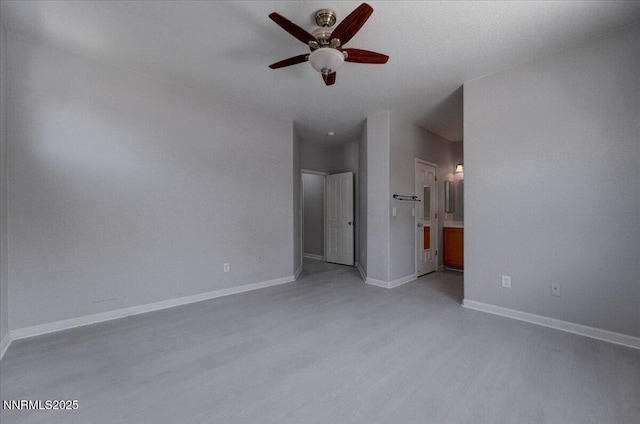 5737 Sonora Pass Dr, Sparks, NV 89436 - unfurnished room featuring a ceiling fan, light wood-style flooring, and baseboards