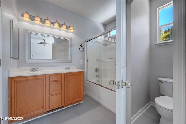 5737 Sonora Pass Dr, Sparks, NV 89436 - full bath featuring toilet, combined bath / shower with glass door, double vanity, and baseboards