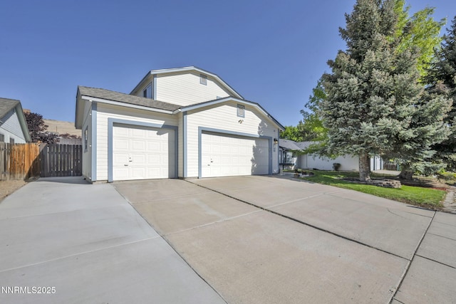7395 Pah Rah Dr, Sparks, NV 89436 - view of front of house featuring concrete driveway and a garage