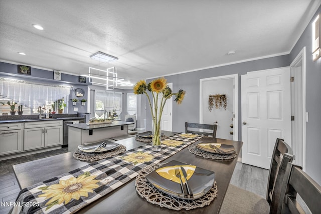 7395 Pah Rah Dr, Sparks, NV 89436 - dining space with dark wood finished floors, a textured ceiling, and recessed lighting