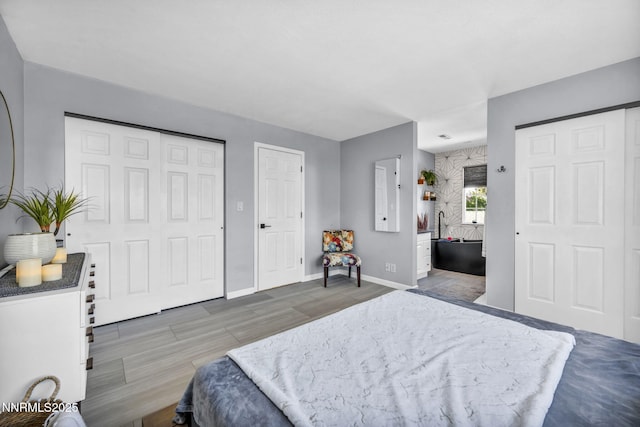 7395 Pah Rah Dr, Sparks, NV 89436 - bedroom featuring baseboards and wood finished floors