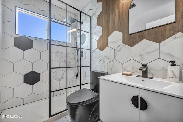 7395 Pah Rah Dr, Sparks, NV 89436 - bathroom with tile walls, a tile shower, toilet, and vanity