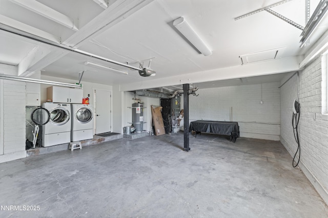 13820 Virginia Foothills Dr, Reno, NV 89521 - garage with independent washer and dryer, strapped water heater, and a garage door opener