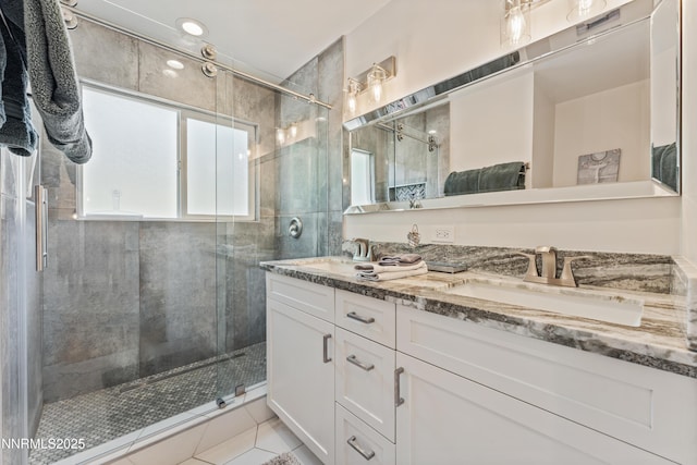 13820 Virginia Foothills Dr, Reno, NV 89521 - full bathroom featuring double vanity, a shower stall, and tile patterned floors