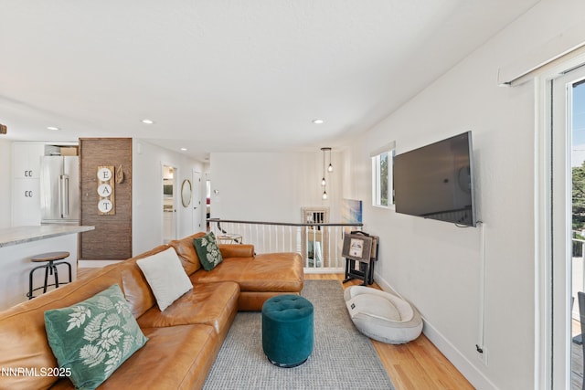 13820 Virginia Foothills Dr, Reno, NV 89521 - living area with healthy amount of natural light, light wood-style floors, and recessed lighting