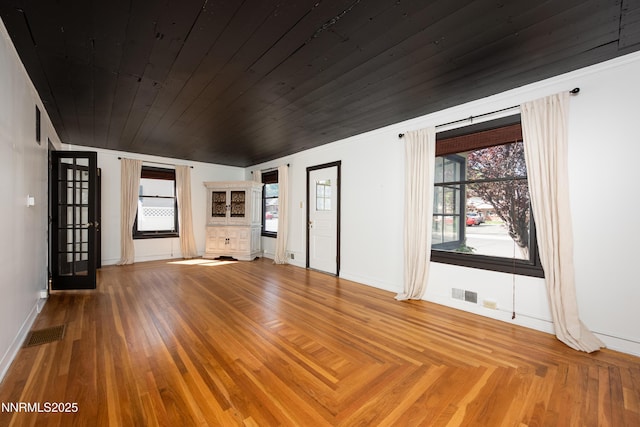 1417 Douglas Ave, Gardnerville, NV 89410 - unfurnished living room with baseboards and wooden ceiling