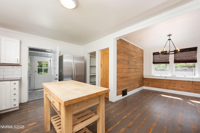 1417 Douglas Ave, Gardnerville, NV 89410 - kitchen featuring freestanding refrigerator, dark wood-style flooring, white cabinets, a chandelier, and butcher block counters
