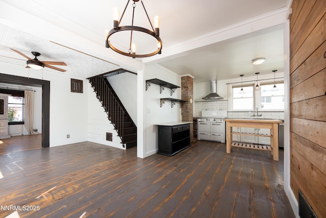 1417 Douglas Ave, Gardnerville, NV 89410 - kitchen featuring wall chimney exhaust hood, open shelves, dark wood-style floors, tasteful backsplash, and a chandelier