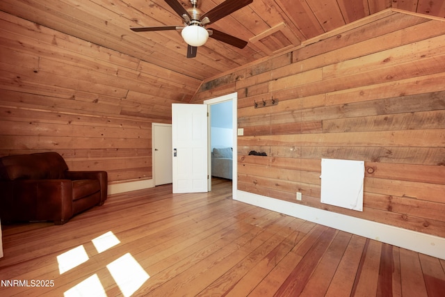 1417 Douglas Ave, Gardnerville, NV 89410 - unfurnished room featuring wooden ceiling, wood walls, lofted ceiling, ceiling fan, and light wood-style floors