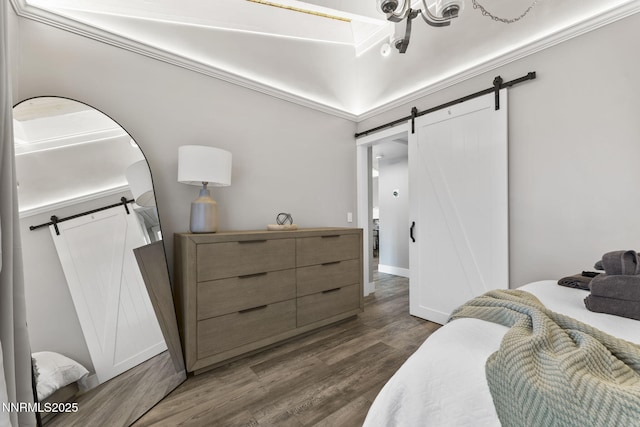 810 Alder Ave Unit 71, Incline Village, NV 89451 - bedroom with a barn door and wood finished floors