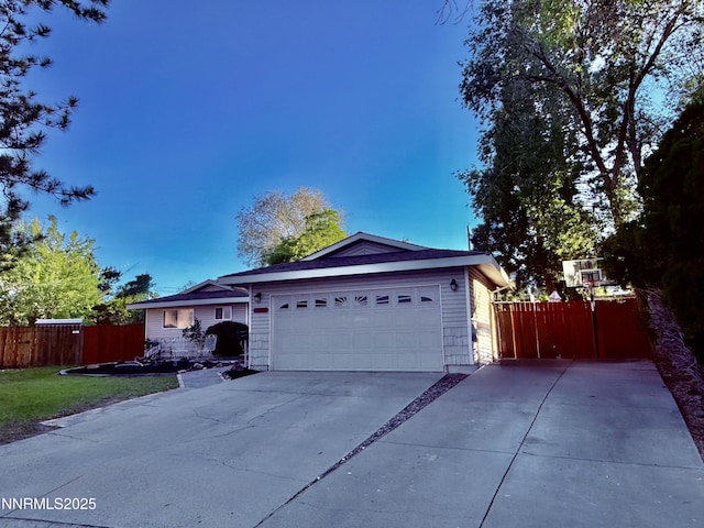 3100 Pine Ln, Carson City, NV 89706 - single story home with driveway and a garage