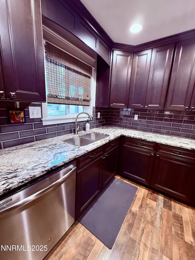 3100 Pine Ln, Carson City, NV 89706 - kitchen with a sink, stainless steel dishwasher, decorative backsplash, and light wood-style flooring