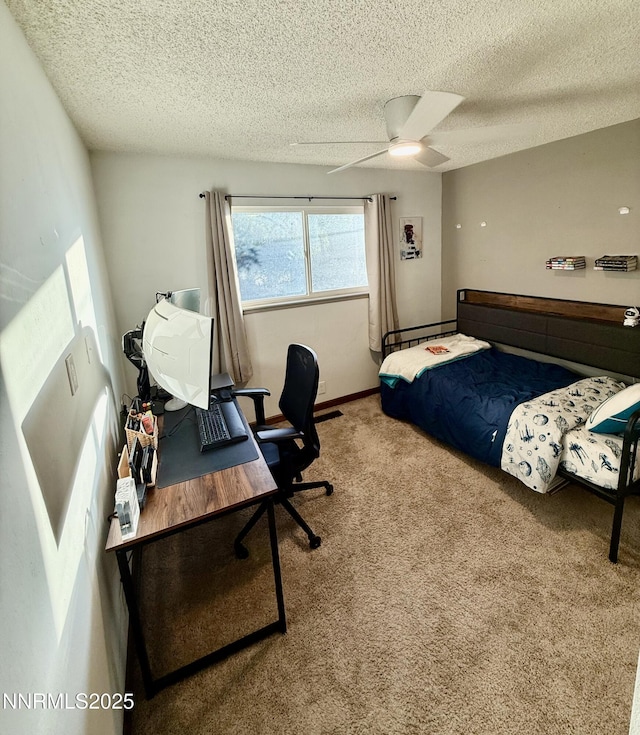 3100 Pine Ln, Carson City, NV 89706 - carpeted bedroom with a textured ceiling, a desk, and ceiling fan