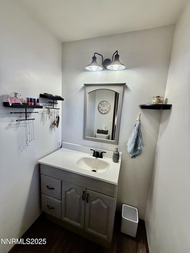 3100 Pine Ln, Carson City, NV 89706 - bathroom featuring vanity and wood finished floors